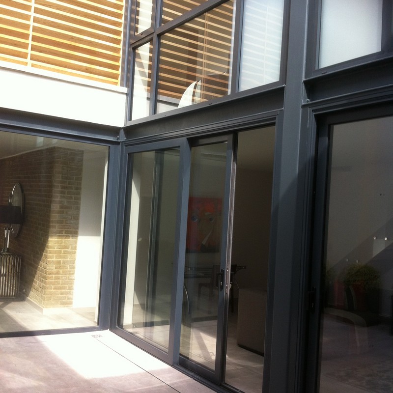 Anthracite aluminium sliding patio doors fitted in Manor Park