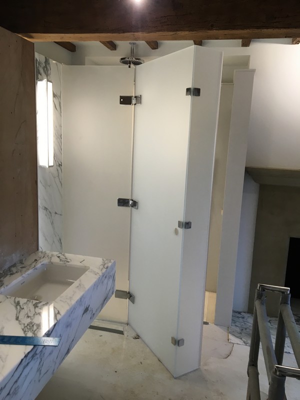 Bespoke frosted glass shower enclosure in Manor Park luxury bathroom